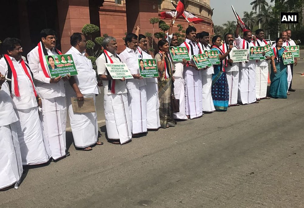 AIADMK MPs protest outside the Parliament for the Cauvery Management Board. ANI/twitter photo.