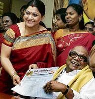New turf: Tamil actress Kushboo with Tamil Nadu Chief Minister and DMK President M Karunanidhi while formally joining the party in Chennai on Friday. PTI