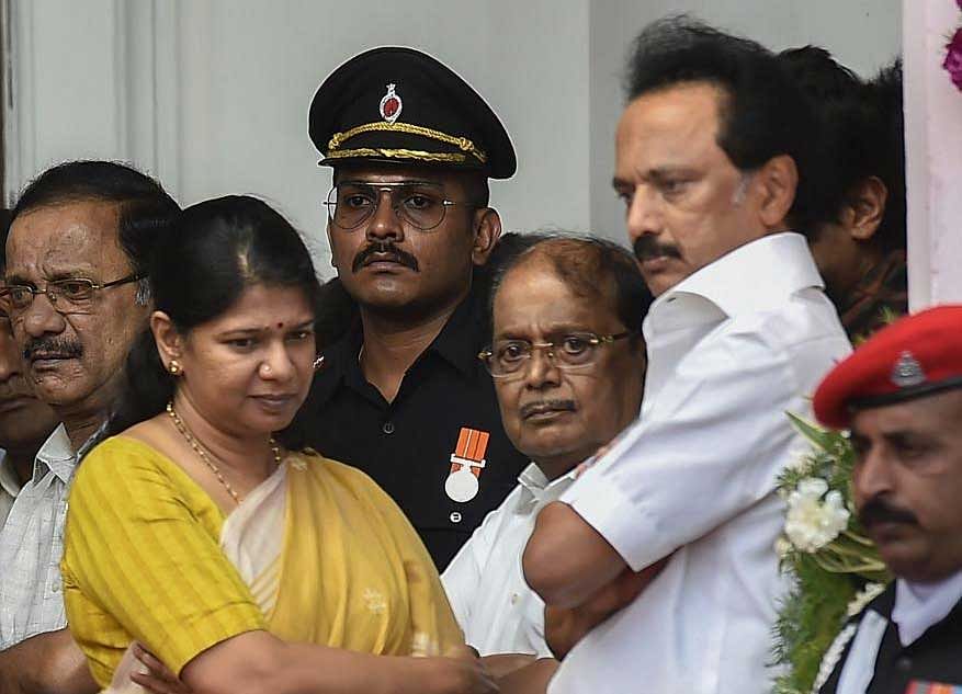 DMK leaders MK Stalin and Kanimozhi stand alongside the mortal remains of their father and DMK chief M Karunanidhi at Rajaji Hall, in Chennai on Wednesday. PTI Photo
