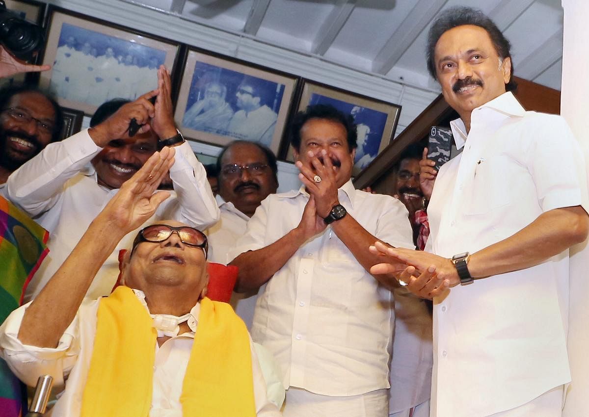 DMK Supremo M Karunanidhi meets his party workers on his 95th birthday outside his residence, in Chennai on Sunday, June 03, 2018. DMK Working President MK Stalin is also seen. (PTI File Photo)