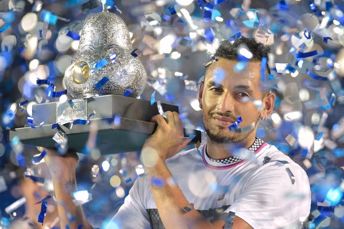 RED-HOT: Australia's Nick Kyrgios with the Mexico Open trophy after defeating Germany's Alexander Zverev in the final on Sunday. AFP 