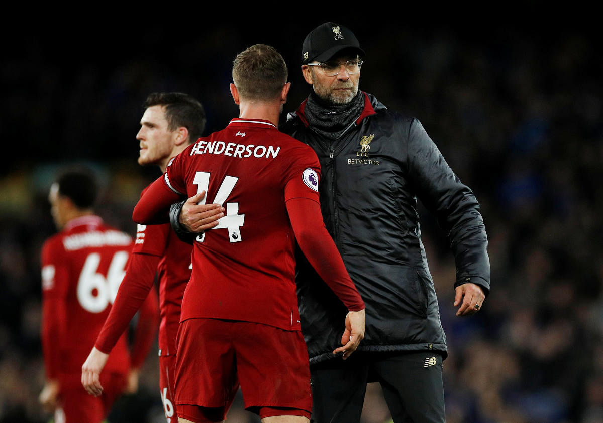 Liverpool manager Juergen Klopp and Liverpool's Jordan Henderson after the match. Reuters