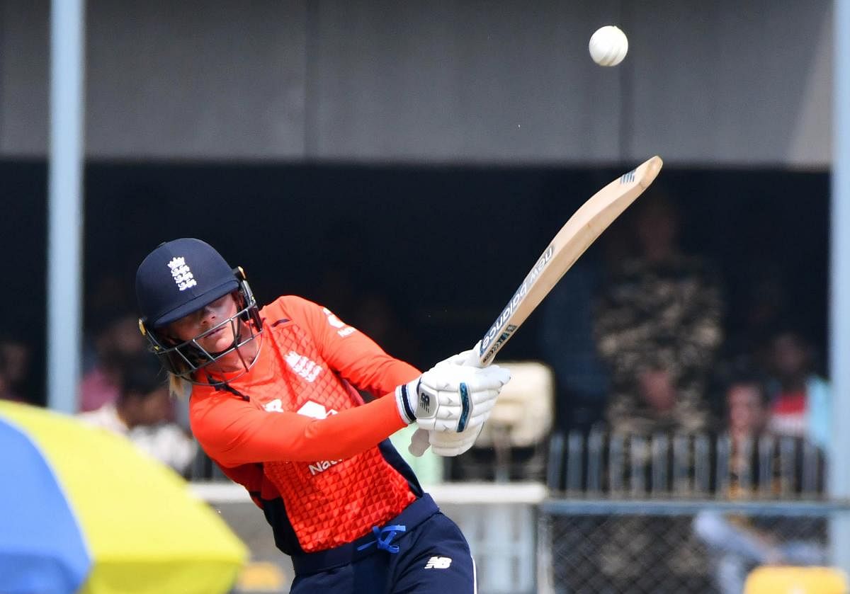 England’s Danielle Wyatt plays a shot during the first match of the women's Twenty20 series between India and England at the Barsapara Cricket Stadium in Guwahati. (AFP Photo)