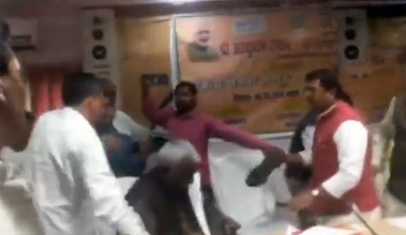 A video, that went viral on the social networking sites, showed Tripathi hitting Baghel with his shoe repeatedly. Baghel was also seen slapping the MP. (screengrab)