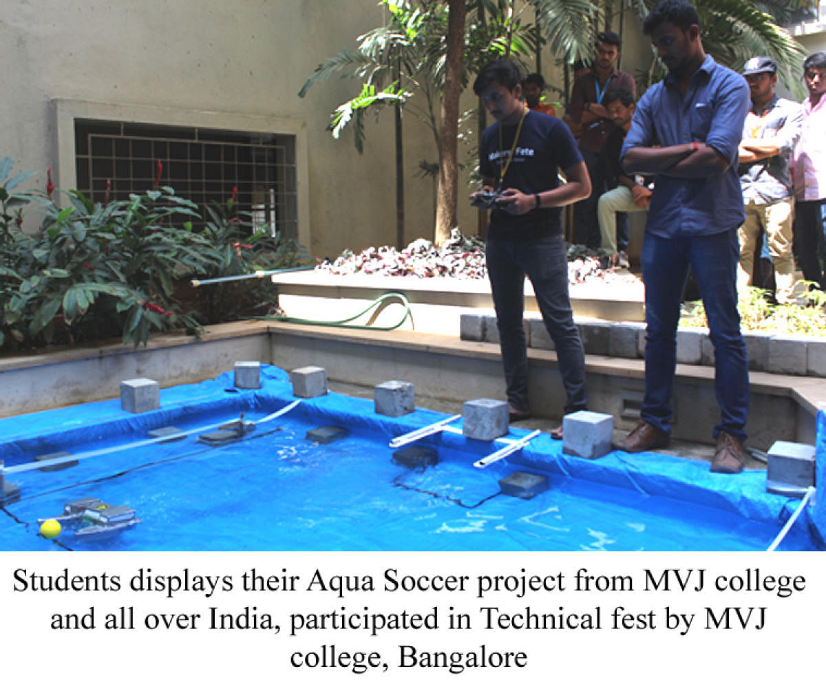 Students from MVJ College of Engineering display their aqua soccer project. 