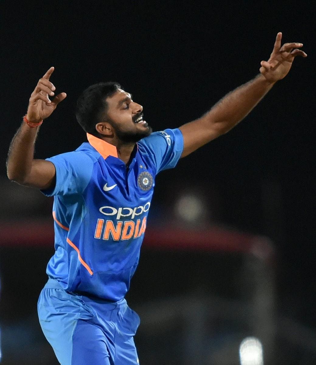 India's Vijay Shankar celebrates after dismissing of Australia's Marcus Stoinis in their second ODI in Nagpur on Tuesday. PTI