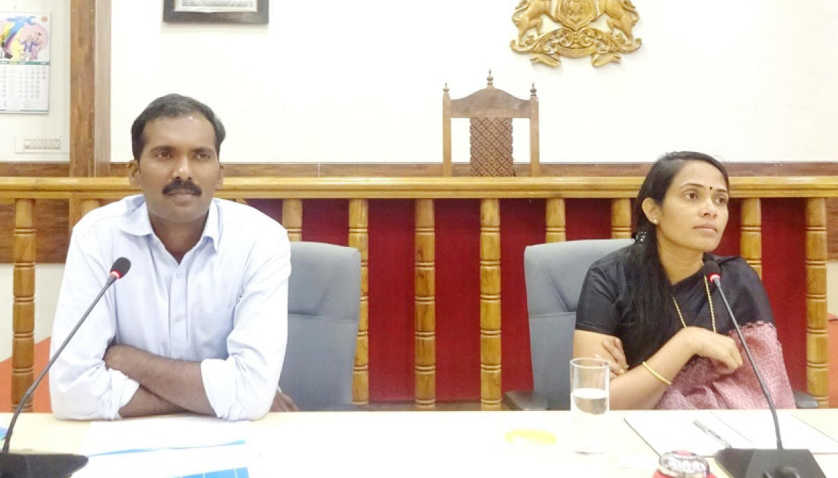 Deputy Commissioner Annies Kanmani Joy speaks at a meeting at her office in Madikeri on Wednesday. Additional Deputy Commissioner Y Yogish looks on.