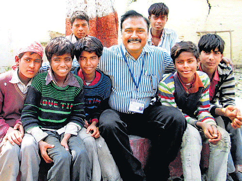 Jitendra Chaturvedi with rescued children.