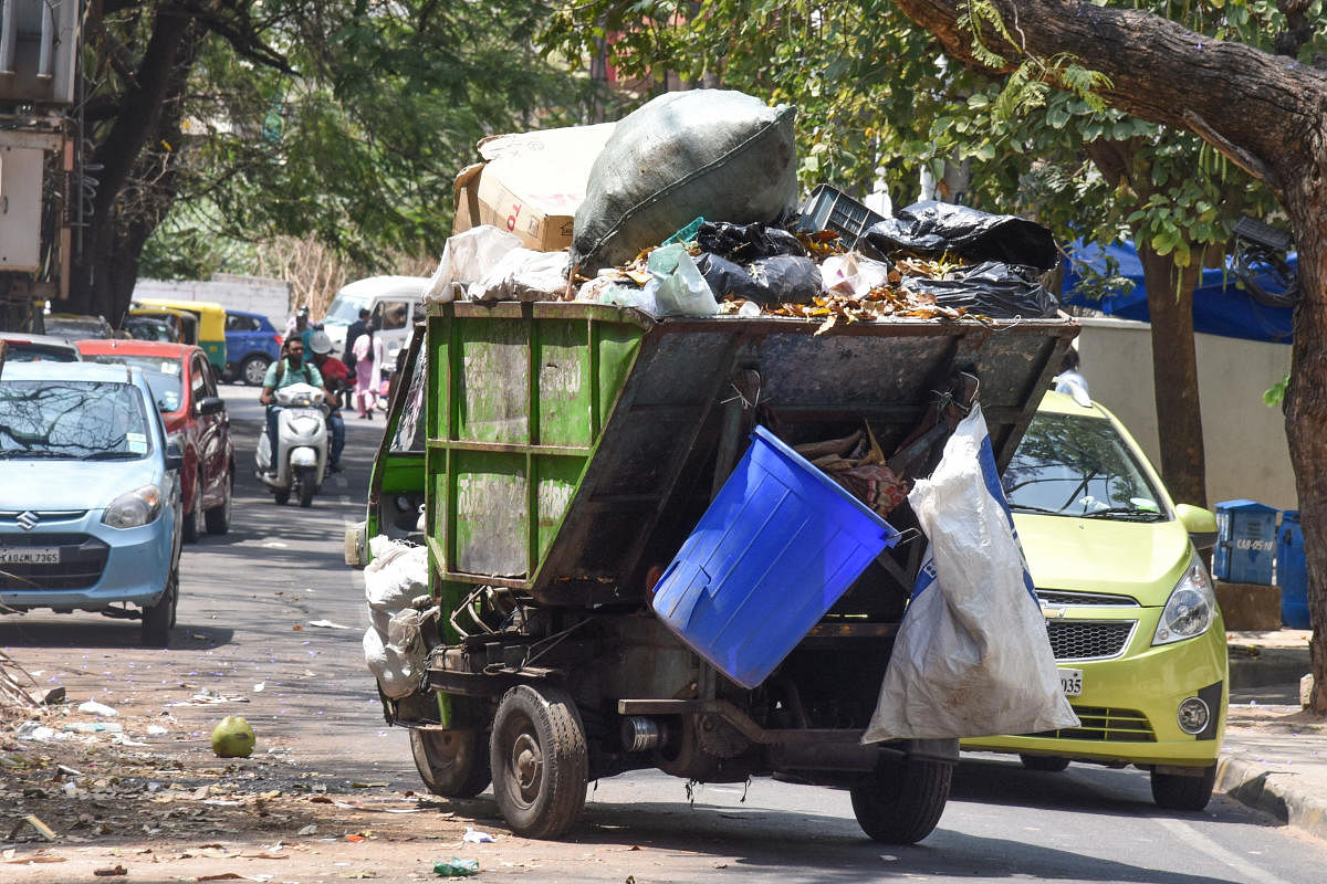 Garbage trippers in Bengaluru. Photo by S K Dinesh