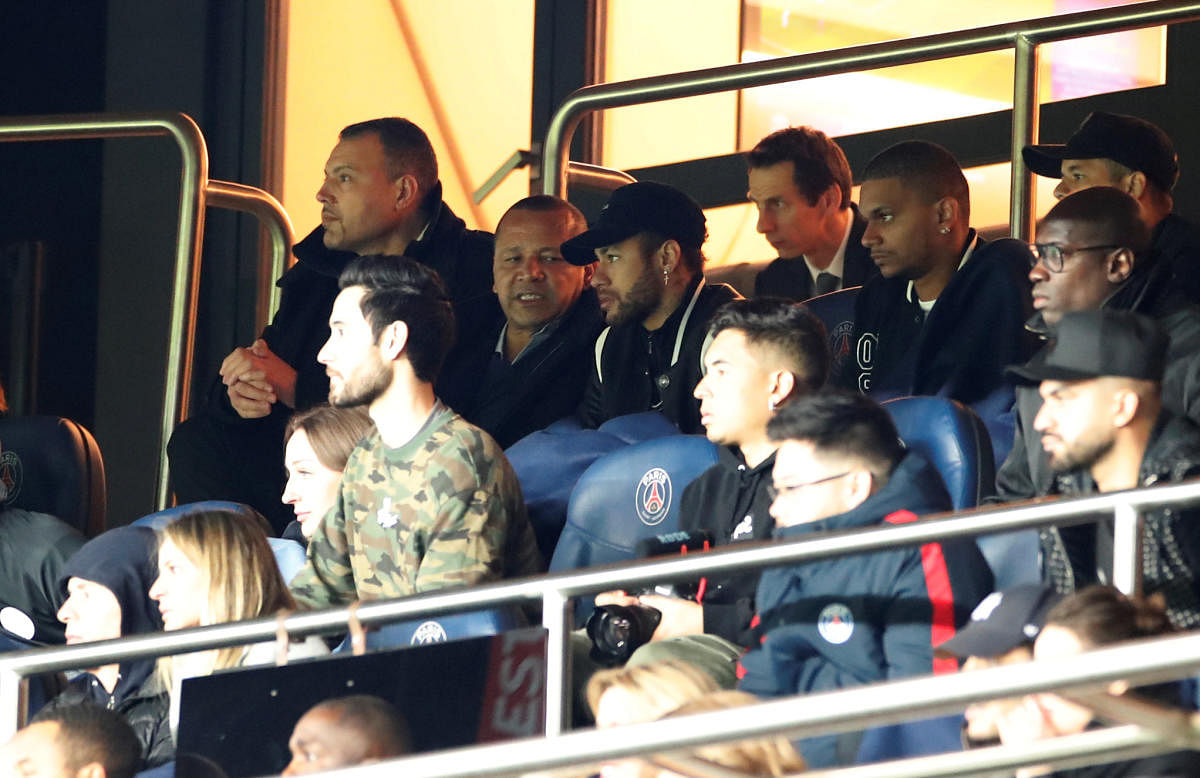 Paris St Germain's Neymar sat alongside Neymar Santos Sr in the stands during the match. (REUTERS)