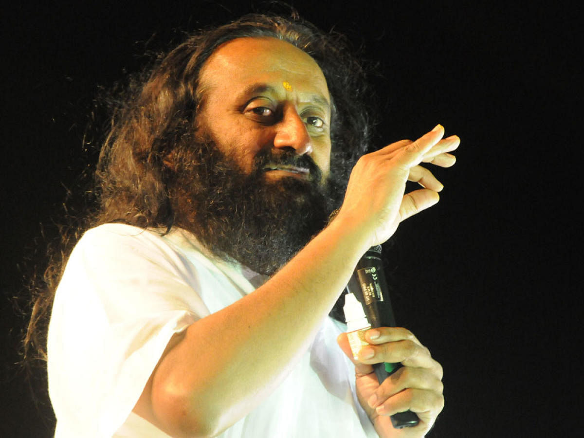 "We must all move together towards ending long-standing conflicts happily by maintaining harmony in society," Sri Sri Ravishankar said. (DH File Photo)