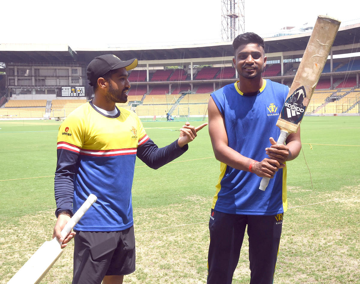 Rohan Kadam (right) slammed 45-ball unbeaten 62 in Karnataka's nine-wicket win over Mumbai. DH PHOTO