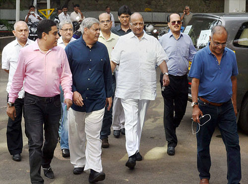 Former BCCI Presidents Sharad Pawar and Shashank Manohar come out of BCCI headquarters in Mumbai on Saturday. PTI Photo