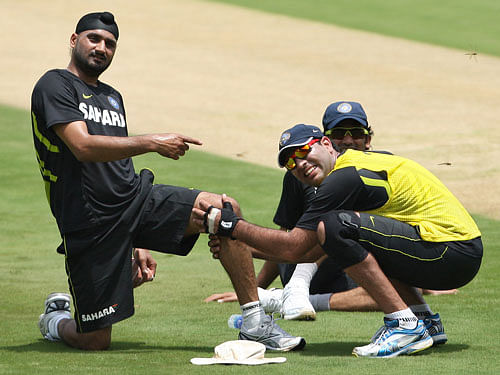 Senior India players Harbhajan Singh and Yuvraj. AP file photo
