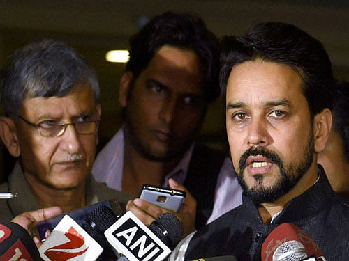 BCCI President Anurag Thakur along with BCCI secretary Ajay Shirke intracts with media at the BCCI headquarters after the SGM in Mumbai on Saturday. PTI Photo