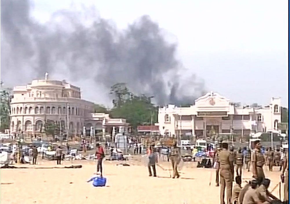 The unruly crowd has reportedly set  the Ice House police station near Marina beach and other vehicles on fire.   ANI Photo
