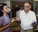 IPL vice chairman Niranjan Shah (right) comes out of BCCI office in Mumbai on Friday. PTI