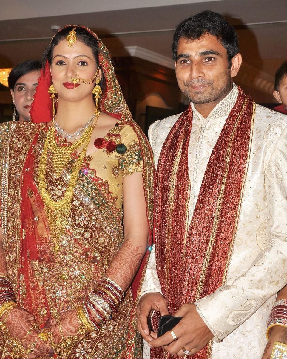 File photo of Cricketer Mohammad Shami with his wife Kolkata based model Haseen Janha, PTI file photo