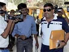 Indian cricket team's T-20 manager Ranjib Biswal (C) arrives at BCCI headquarters to submit his report in Mumbai on Saturday. PTI