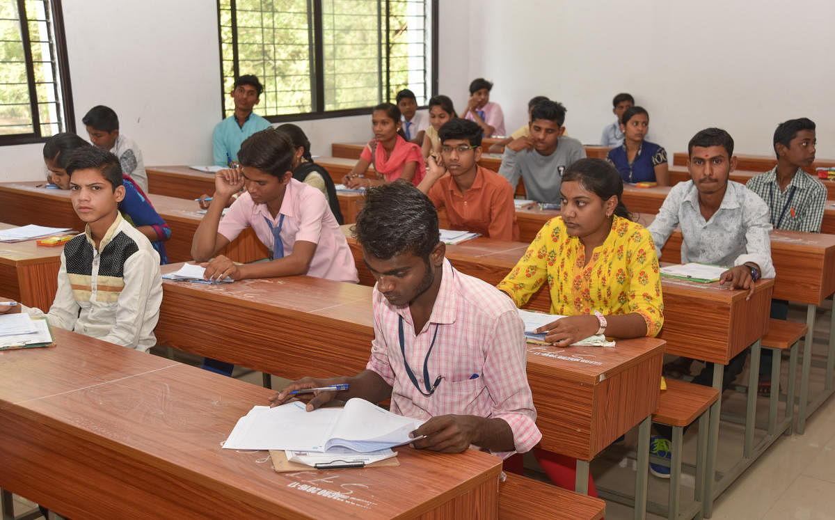 Students appearing for First language at SSLC exam at Government PU College in Kalaburagi. - DH Photo/ Prashanth HG