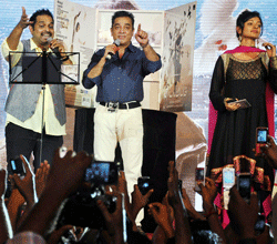 Actor Kamal Haasan with music composer Shankar Mahadevan at the music launch of 'Viswaroopam' in Madurai on Friday. PTI Photo