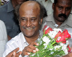 Actor Rajinikanth receives greetings from his fans during his 63rd birthday celebration at his residence in Chennai on Wednesday. This year his birthday assumes special significance as it appears as 12.12.12. PTI