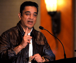 Actor Kamal Haasan speaks during a press conference to announce the premiere of the upcoming film Vishwaroop in Mumbai on January 4, 2013. AFP PHOTO