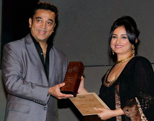 Actor Kamal Haasan with actress Divya Dutta during the closing ceremony of 4th Jagran Film Festival in Mumbai . File - PTI Photo