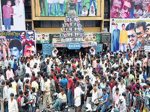 Thousands of cinegoers thronged cinema halls to watch yet another flick of Thalaiva. dh Photo