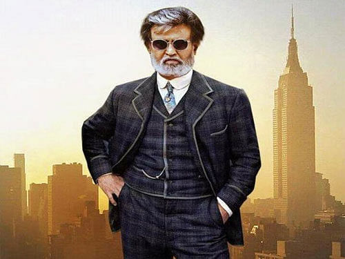 In the Tamil gangster drama, Rajnikanth plays a don, while Radhika is his wife. Movie poster.
