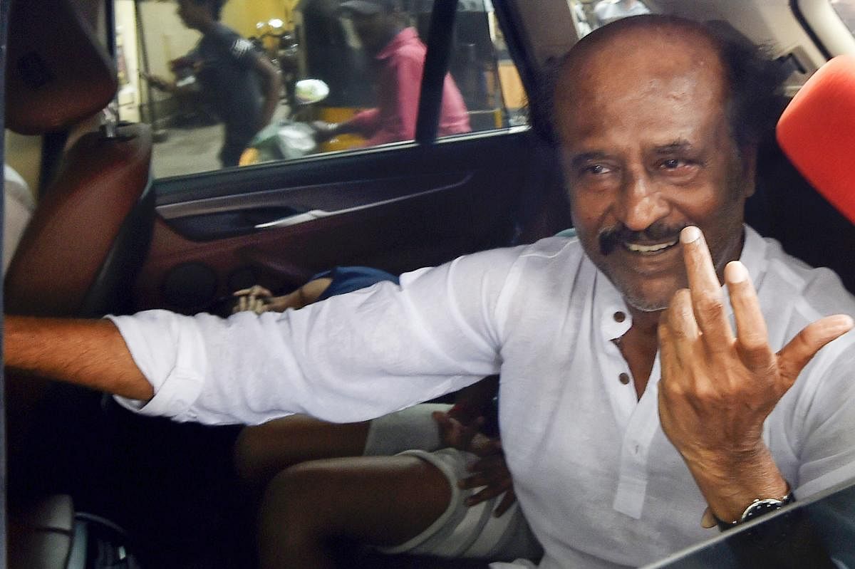 The DMK on Friday alleged that film star Rajinikanth was a puppet in the hands of "some persons" and was being supported by "communal" elements. PTI file photo