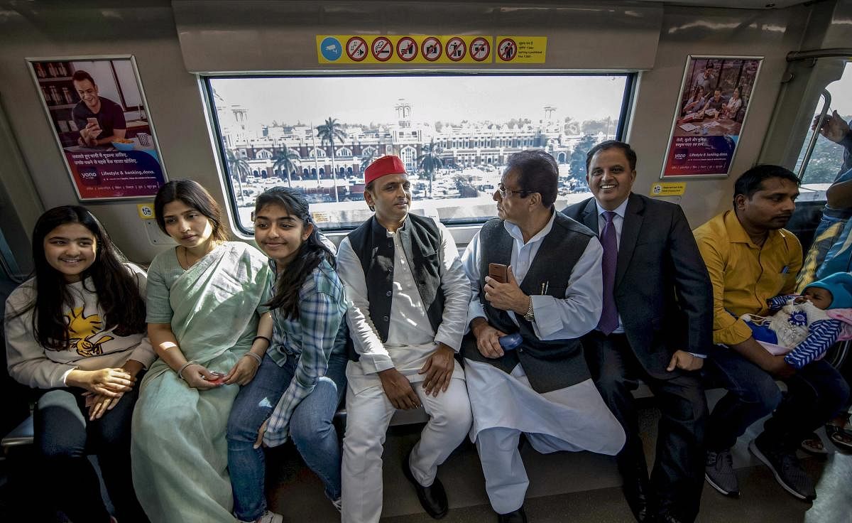 Samajwadi Party President Akhilesh Yadav along with his family and party leaders take a metro ride in Lucknow, Sunday, March 10 2019. PTI