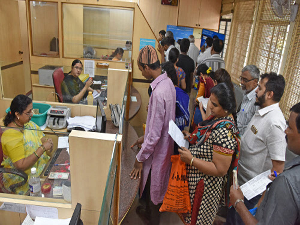 The public-sector banks (PSBs) are lagging behind the counterparts from the private sector when it comes to the digitisation of the transaction, reveals a study. DH file photo for representation only