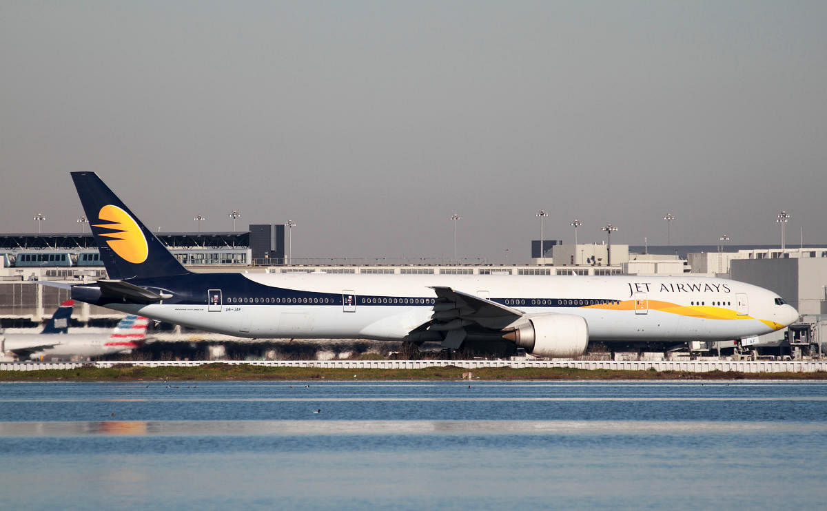 FILE PHOTO: A Jet Airways Boeing 777-300ER taxis at San Francisco International Airport, San Francisco, California, February 16, 2015. REUTERS/Louis Nastro/File Photo