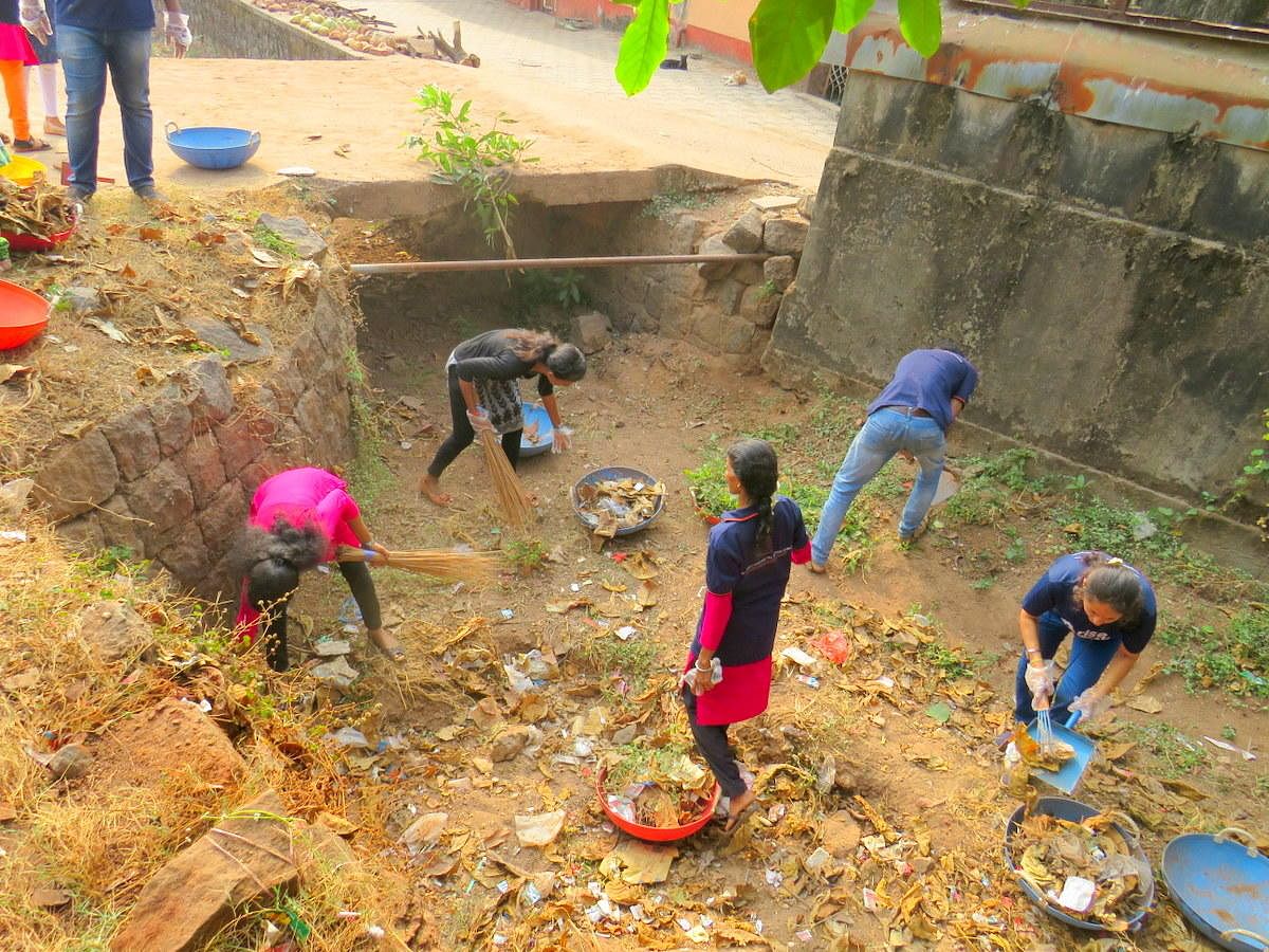 Volunteers take part in the 14th cleanliness drive under the fifth phase of Swachhata Abhiyan conducted by Ramakrishna Mission at Jeppu in Mangaluru on Sunday.