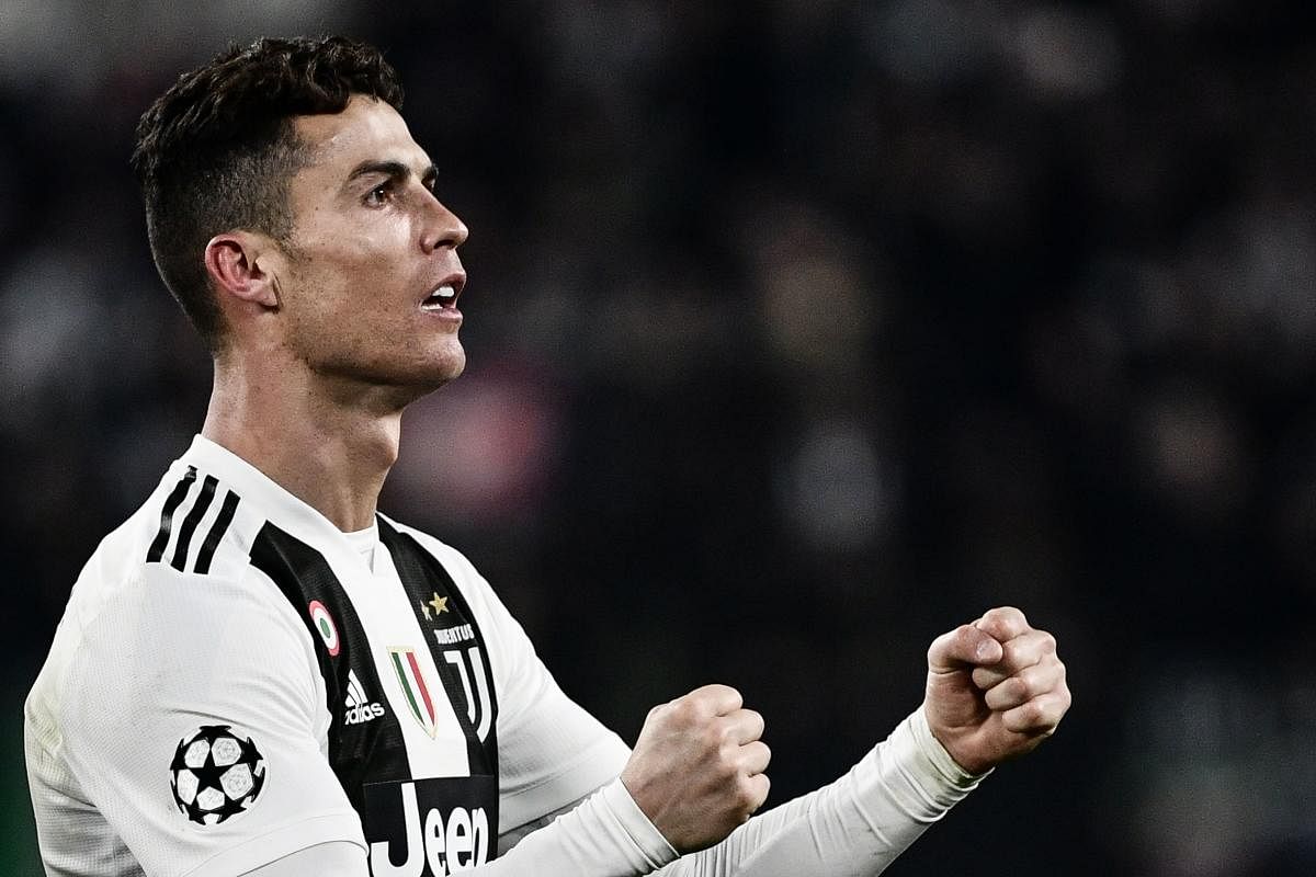 Juventus' Cristiano Ronaldo celebrates after scoring against Atletico Madrid in their Champions League last-16 second leg match on Tuesday. AFP