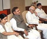 BJP President Nitin Gadkari with senior party leaders LK Advani, Sushma Swaraj and JD(U) President Sharad Yadav during an NDA meeting in New Delhi on Monday. PTI