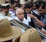 Former Chief Minister B S Yeddyurappa boards his car at City Civil Court complex after the hearing of case against him at Lokayukta Special Court in Bangalore on Monday. Photo DHNS