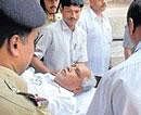 Former chief minister B S Yeddyurappa being taken out on a stretcher to Parappana Agrahara jail from Victoria Hospital in Bangalore on Wednesday. KPN