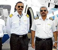 Pilot Group Captain S K Bhatia and co-pilot M S Reddy minutes before boarding the ill-fated Bell 430 helicopter. PTI