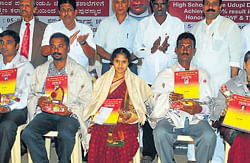 The district-level award winning teachers being felicitated in Udupi on Wednesday. dh photo