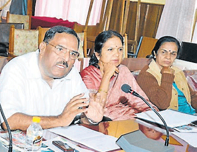 Karnataka Janapada Parishat president T Thimme Gowda speaks at a meeting in in Madikeri recently. DH Photo