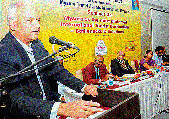 to boost tourism: Additional Chief Secretary, Aravind Jadhav speaks at a seminar held in the city on Tuesday. President of Rotary West S N Parthnath and Deputy Commissioner C&#8200;Shikha are seen. dh photo