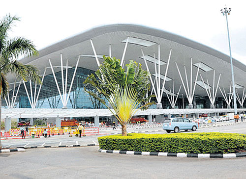 Posing as police officers, two men robbed three persons of cash, laptops and a mobile phone after picking them up from a parking lot of the Kempegowda International Airport on the pretext of verifying their credentials. The incident took place early Monday morning. DH file photo