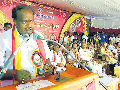 H D Kumaraswamy speaks at a literary meet during his visit to Maddur, Mandya district, on Tuesday. DH PHOTO