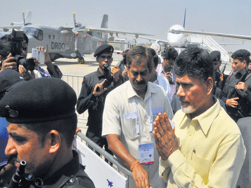 Andhra Pradesh Chief Minister Chandrababu Naidu arrive at Yelahanka airbase in Bengaluru during Aero India 2015 on Thursday. DH PHOTO BY B K JANARDHAN