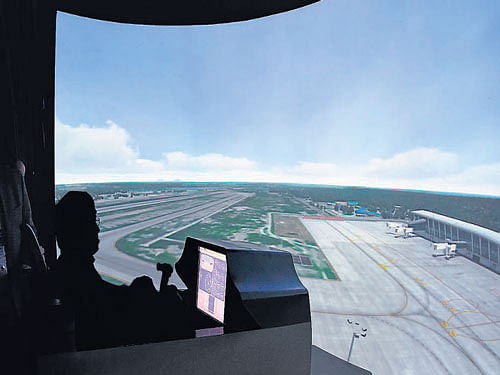 Flying over KIA in a helicopter simulator. DH photo/Manjunath
