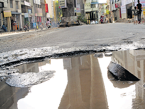 This stretch of Mahakavi Kuvempu Road in Gayatri Nagar poses great danger tomotorists. DH PHOTO