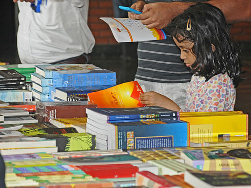 Visitors looking books exhibit at Bangalore Literature Festival organised by BLF Friends at Crowne Plaza, Velankani Park, Electronics City Bangalore on Friday. DH File Photo