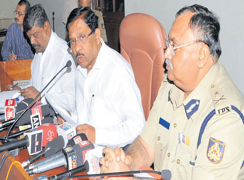 Home Minister G Parameshwara addresses a press conference in Bengaluru on Thursday. Police Commissioner NS Megharikh, Advisor to Home Minister Kempaiah and DG & IGPOm Prakash are seen. DH PHOTO